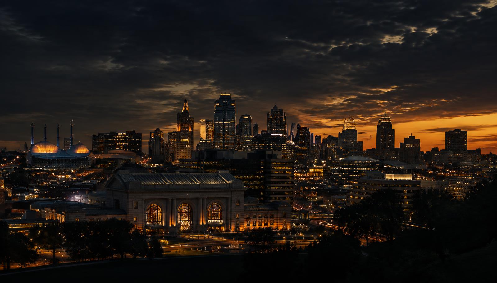 Kansas City skyline at dusk with Union Station glowing gold
